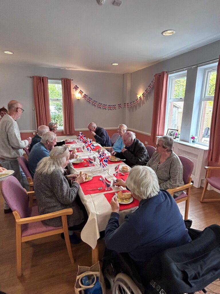 clients at the day centre enjoy a hot lunch